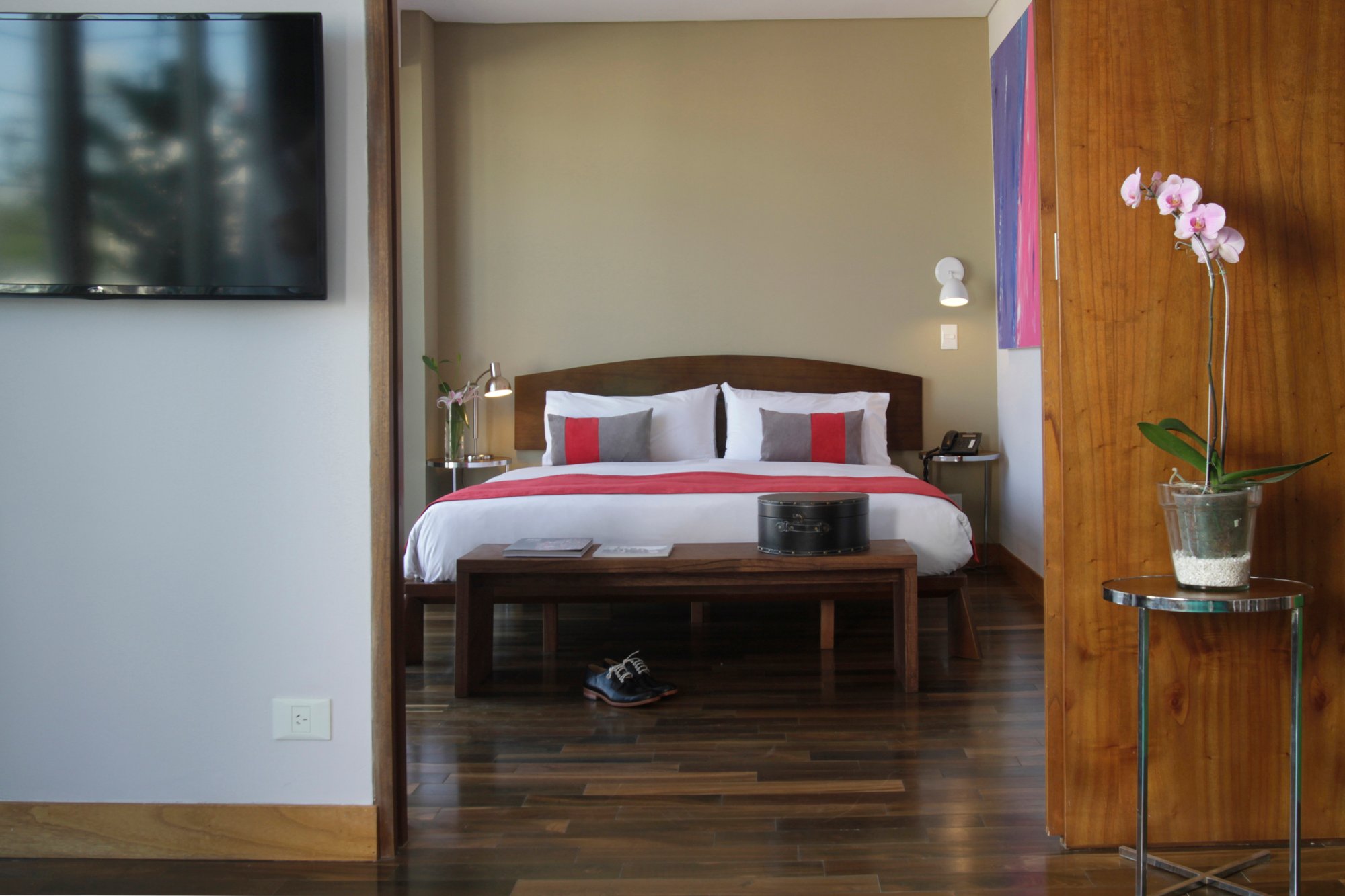 Habitación con cama king en la Suite Palo Santo